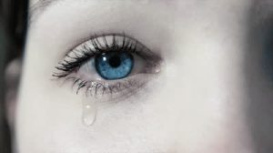 stock-footage-tears-in-a-female-sad-eye-in-p-a-young-girl-weeping-about-sadness-in-p